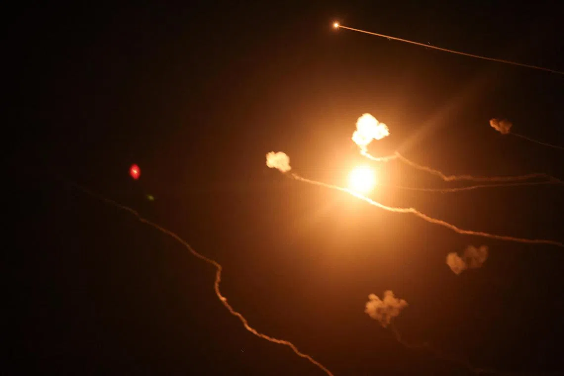 Israel's Iron Dome missile defence system intercepts rockets fired from Lebanon, amid cross-border hostilities between Hezbollah and Israel, as seen from northern Israel, Sept 24, 2024. 

