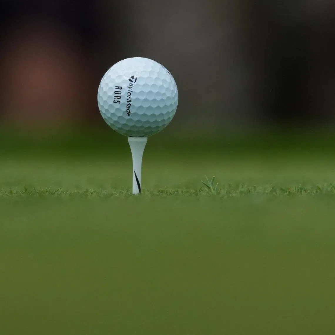 Jun 5, 2026; Dublin, Ohio, USA; The TaylorMade golf ball of Rory McIlroy sits on the first tee during the second round of the Memorial Tournament presented by Workday golf tournament. Mandatory Credit: Aaron Doster-Imagn Images