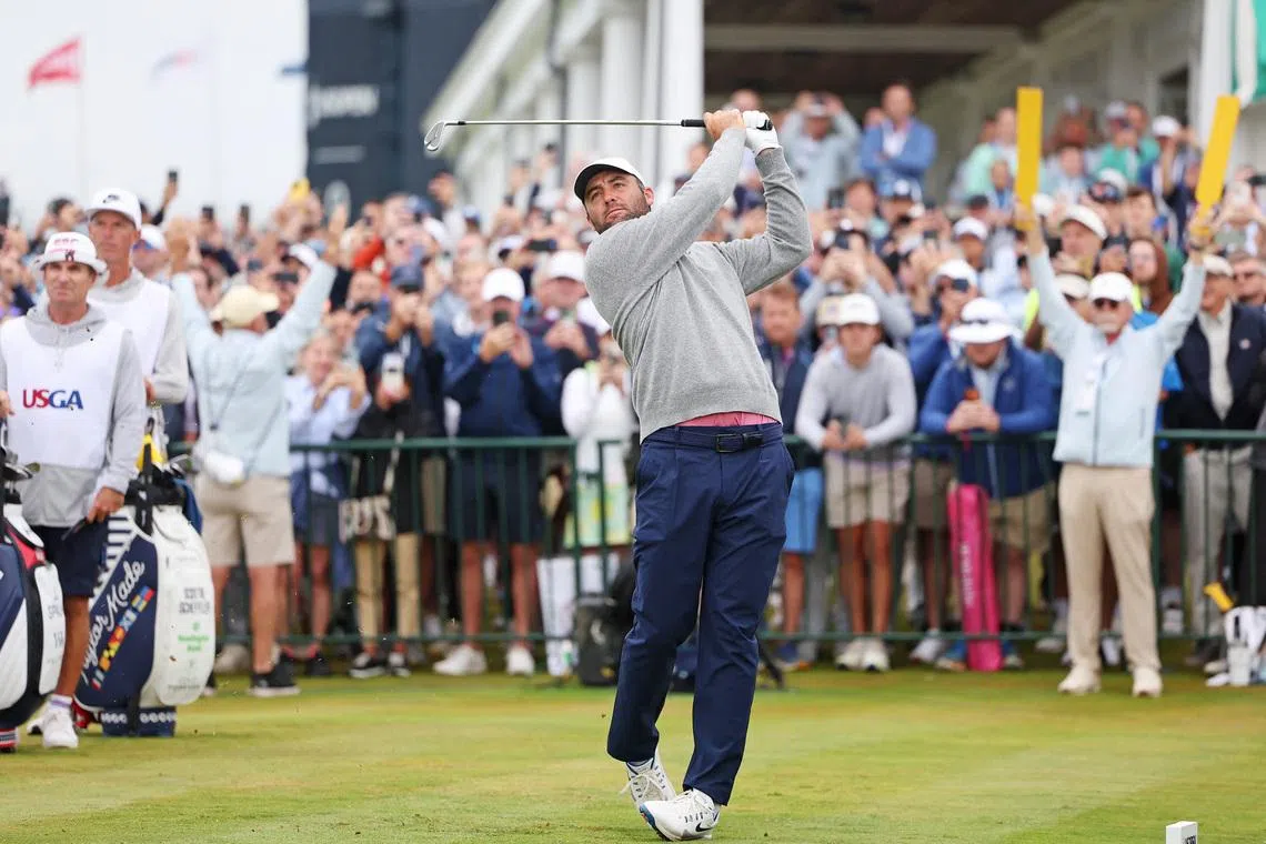 Jun 18, 2026; Southampton, New York, USA; Scottie Scheffler tees off on the first hole during the first round of the U.S. Open golf tournament. Mandatory Credit: Bill Streicher-Imagn Images