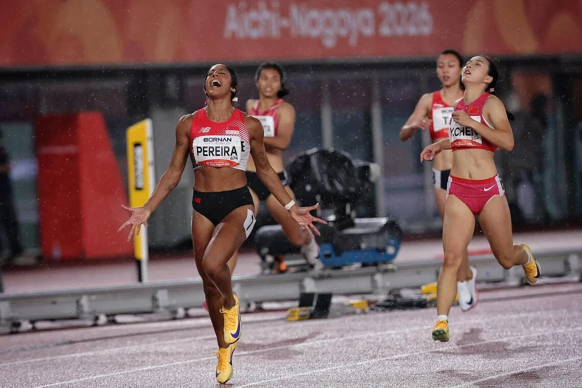 Shanti Pereira of Singapore in jubilation after finishing first in the Asian Games Athletics Women?s 200m final at the Paloma Mizuho Stadium in Nagoya, Japan on Sept 27, 2026. ST PHOTO: KEVIN LIM pixag27