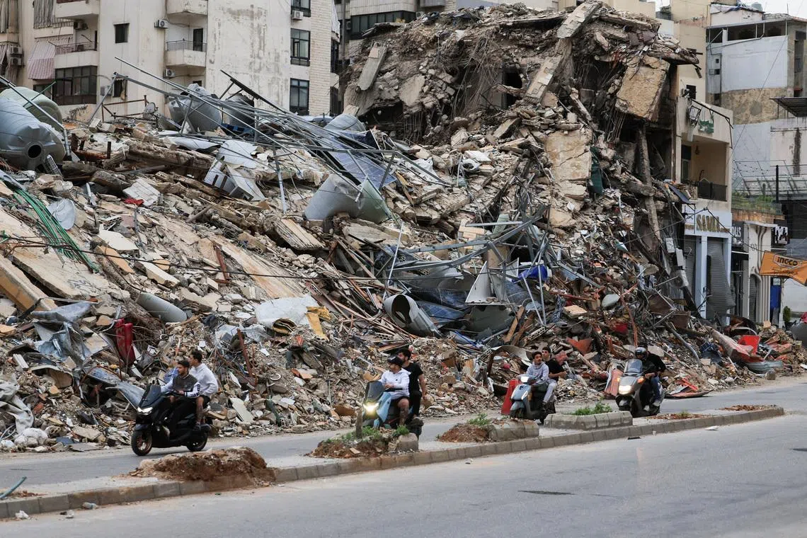 Displaced people make their way as they return to their homes after a 10-day ceasefire between Lebanon and Israel went into effect, at the southern suburbs of Beirut, Lebanon, April 17, 2026.