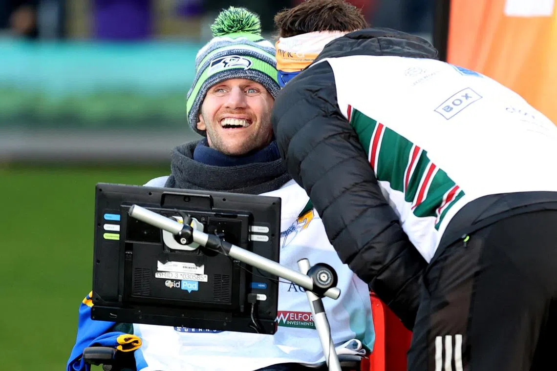 FILE PHOTO: Rugby League - Kevin Sinfield - The Extra Mile Challenge - Headingley Stadium, Leeds, Britain - November 23, 2021 Rob Burrow reacts after Kevin Sinfield completes his 101 mile run in 24 hours to raise money for motor neurone disease research Action Images via Reuters/Carl Recine/File Photo