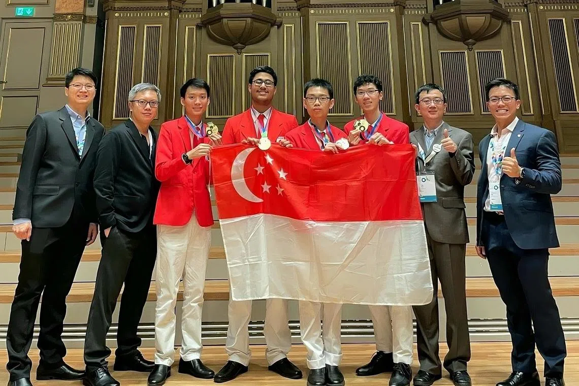 Students (from third left) Lee I-Shiang, Panshul Sharma, Chan Chee Yong Leemen and Marcus Chu Jian-Hao bagged four gold medals at the International Chemistry Olympiad.