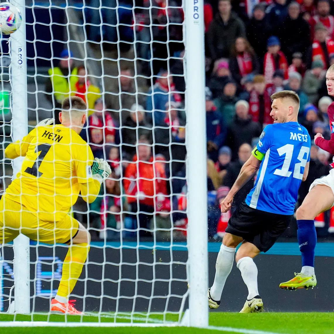 Soccer Football - World Cup - UEFA Qualifiers - Group I - Norway v Estonia - Ullevaal Stadion, Oslo, Norway - November 13, 2025 Norway's Erling Haaland scores their fourth goal Fredrik Varfjell/NTB via REUTERS