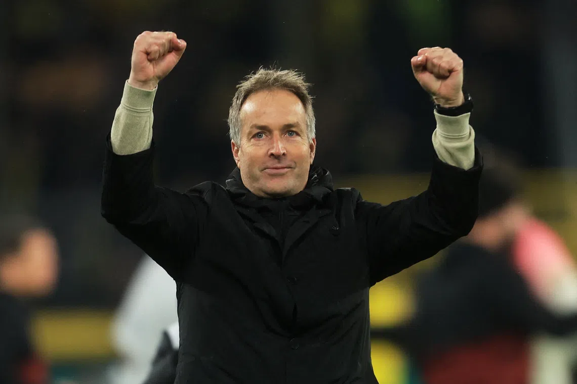 Soccer Football - DFB Cup - Round of 16 - Borussia Dortmund v Bayer Leverkusen - Signal Iduna Park, Dortmund, Germany - December 2, 2025 Bayer Leverkusen coach Kasper Hjulmand celebrates after the match REUTERS/Leon Kuegeler