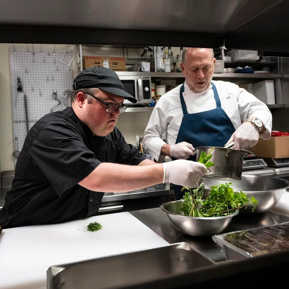 Joseph Valentino (left), a cook at Point Seven in Manhattan, and Franklin Becker, the restaurant’s owner, on March 29, 2026. 
