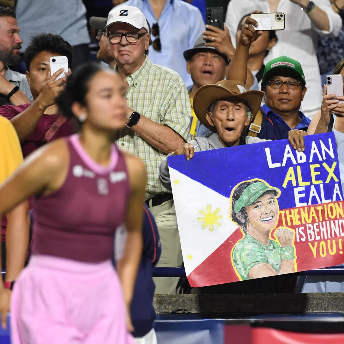 Fans of Alex Eala show their support after she defeated Caty McNally in Toronto.