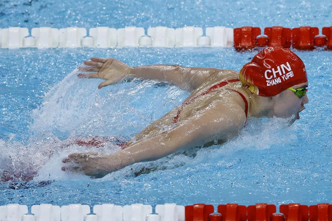 Paris 2024 Olympics - Swimming - Women's 100m Butterfly - Heats - Paris La Defense Arena, Nanterre, France - July 27, 2024. Yufei Zhang of China in action. REUTERS/Ueslei Marcelino