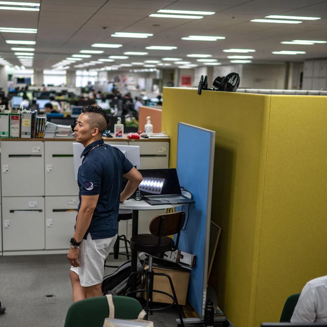 The Tokyo metropolitan government has been encouraging workers to replace suits and ties with T-shirts, trainers and shorts to beat the brutal summer heat.