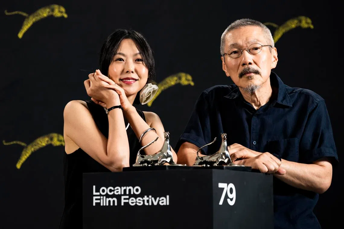 Actress Kim Min-hee (left) and her partner, director Hong Sang-soo, at a photocall at the Locarno Film Festival in Switzerland on Aug 15, 2026.