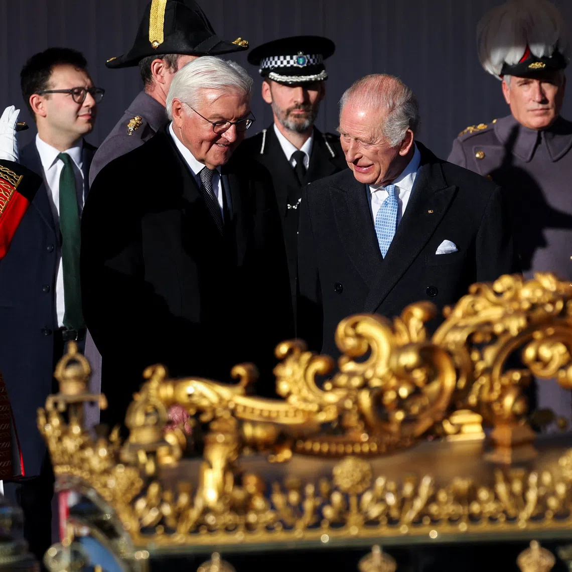 Britain's King Charles and German President Frank-Walter Steinmeier attend a welcome ceremony on the Royal Dais at Datchet Road, during Steinmeier's state visit to Britain, in Windsor, Britain, December 3, 2025. REUTERS/Toby Melville/Pool