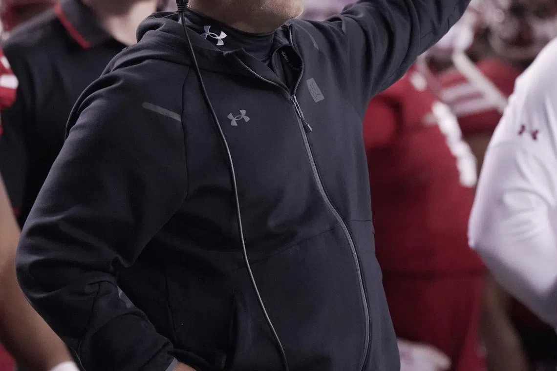 FILE PHOTO: Oct 26, 2024; Madison, Wisconsin, USA; Wisconsin Badgers offensive coordinator Phil Longo during the third quarter against the Penn State Nittany Lions at Camp Randall Stadium. Mandatory Credit: Mark Hoffman/USA TODAY Network via Imagn Images/File Photo