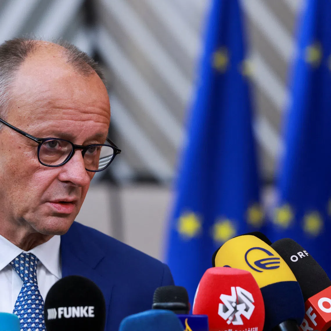 German Chancellor Friedrich Merz speaks to the members of the media during arrivals for European Union leaders' summit in Brussels, Belgium October 15, 2026. REUTERS/Stephanie Lecocq