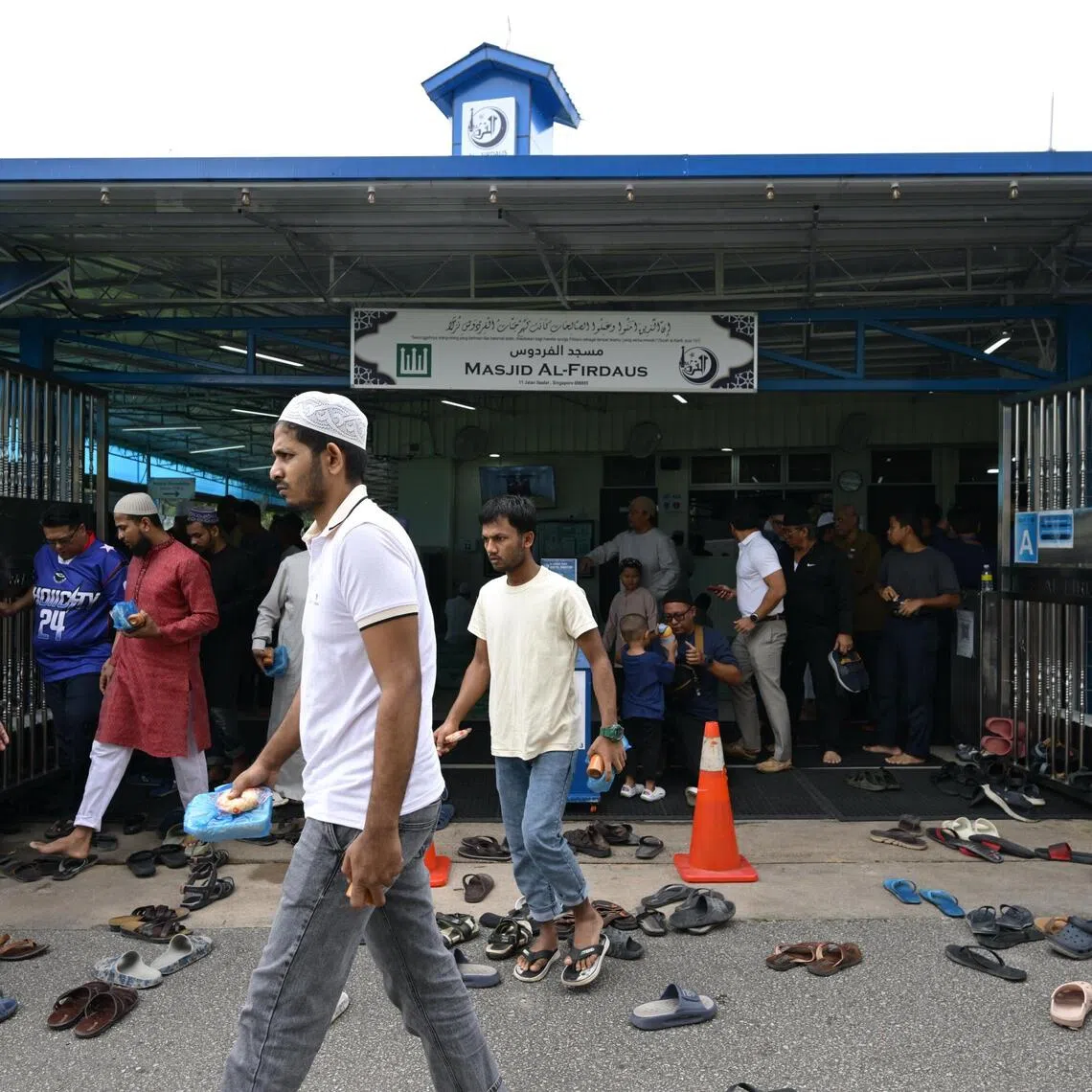 Congregants of Al-Firdaus Mosque leaving the mosque after Friday prayers on Nov 28, 2025.