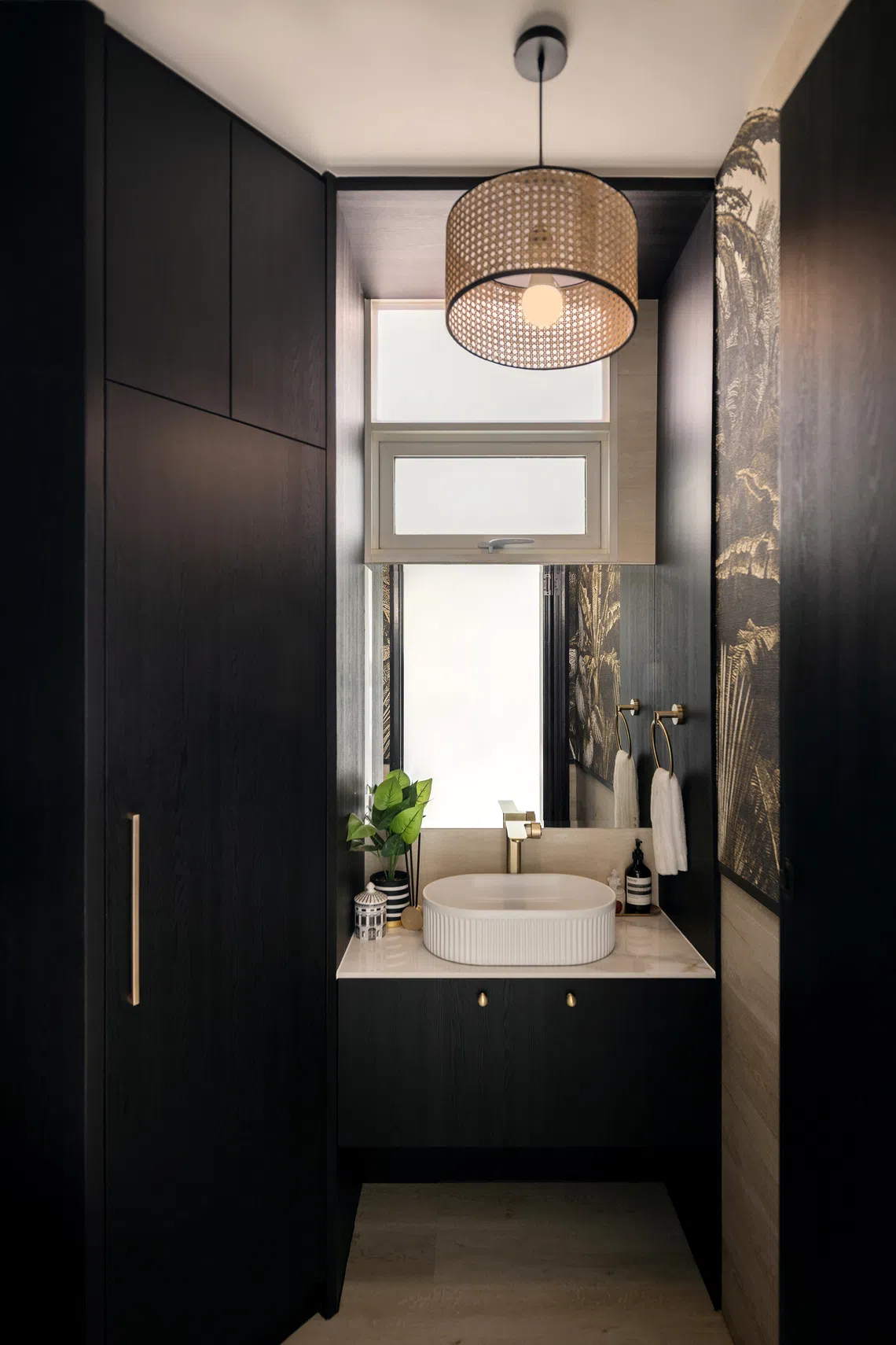 The second bathroom was transformed into a powder room.