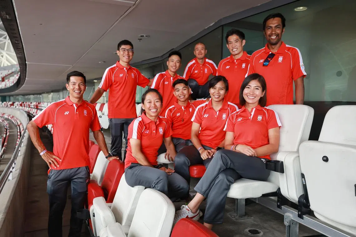 (Standing from left) Singapore Cycling Federation’s Cambodia SEA Games team line-up of Yeo Boon Kiak, Darren Lim, Thomas Tong, Calvin Sim, head coach Adrian Ng, MTB coach Junaidi Hashim, (seated L-R) Chelsie Tan, Arfan Faisal, Luo Yiwei, and Faye Foo at the team reveal at Sports Hub on April 14, 2023.