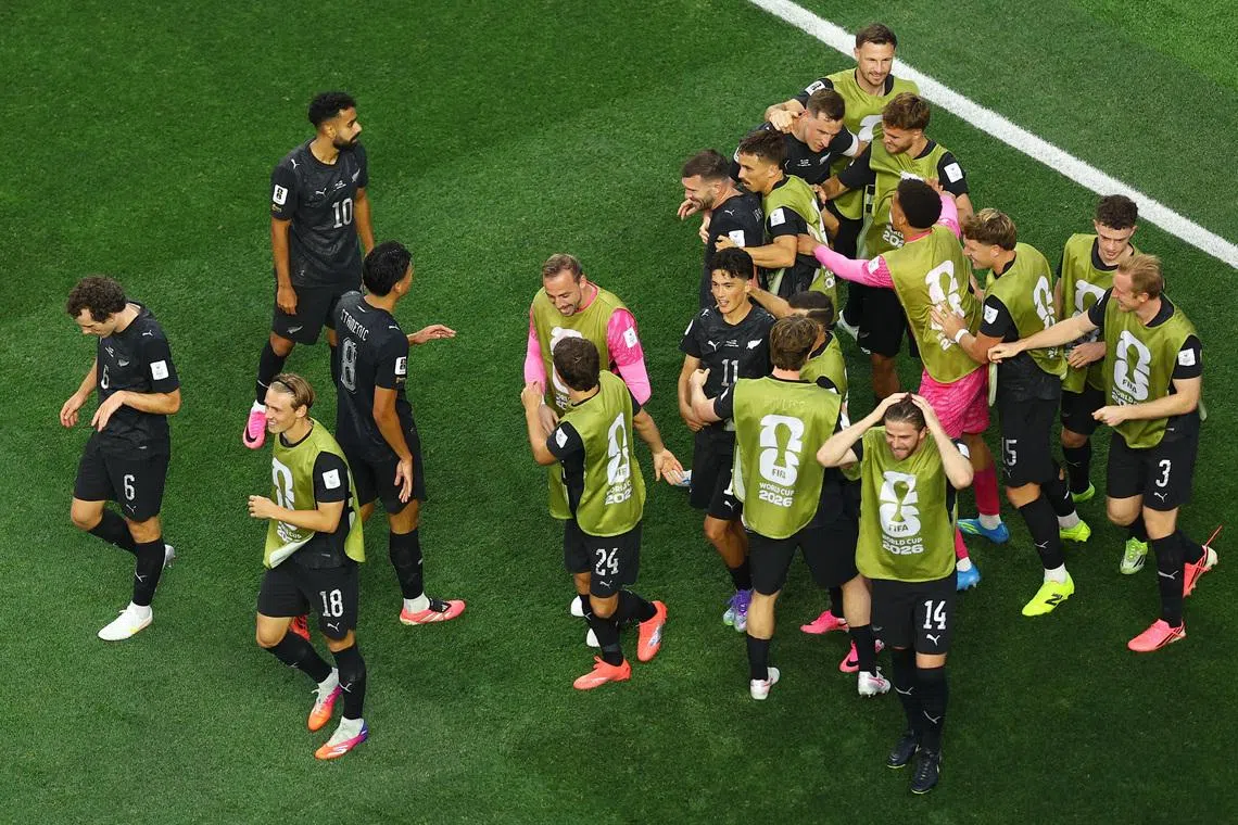 Soccer Football - FIFA World Cup 2026 - Group G - Iran v New Zealand - Los Angeles Stadium, Inglewood, California, U.S. - June 15, 2026 New Zealand's Elijah Just celebrates scoring their second goal with teammates REUTERS/Lisi Niesner