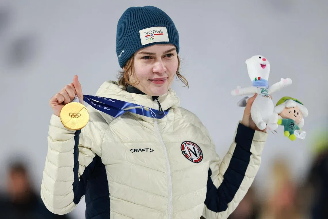 Milano Cortina 2026 Olympics - Ski Jumping - Women's Normal Hill Individual Victory Ceremony - Predazzo Ski Jumping Stadium, Predazzo, Italy - February 07, 2026. Gold medallist Anna Odine Stroem of Norway celebrates on the podium after winning the Women's Normal Hill Individual REUTERS/Stephanie Lecocq