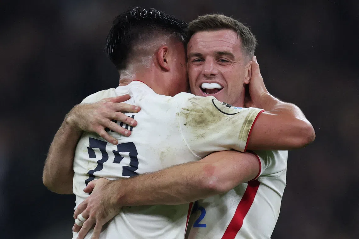 Rugby Union - Autumn Internationals - England v New Zealand - Allianz Stadium, Twickenham, London, Britain - November 15, 2025 England's George Ford celebrates after the match with Marcus Smith REUTERS/Paul Childs