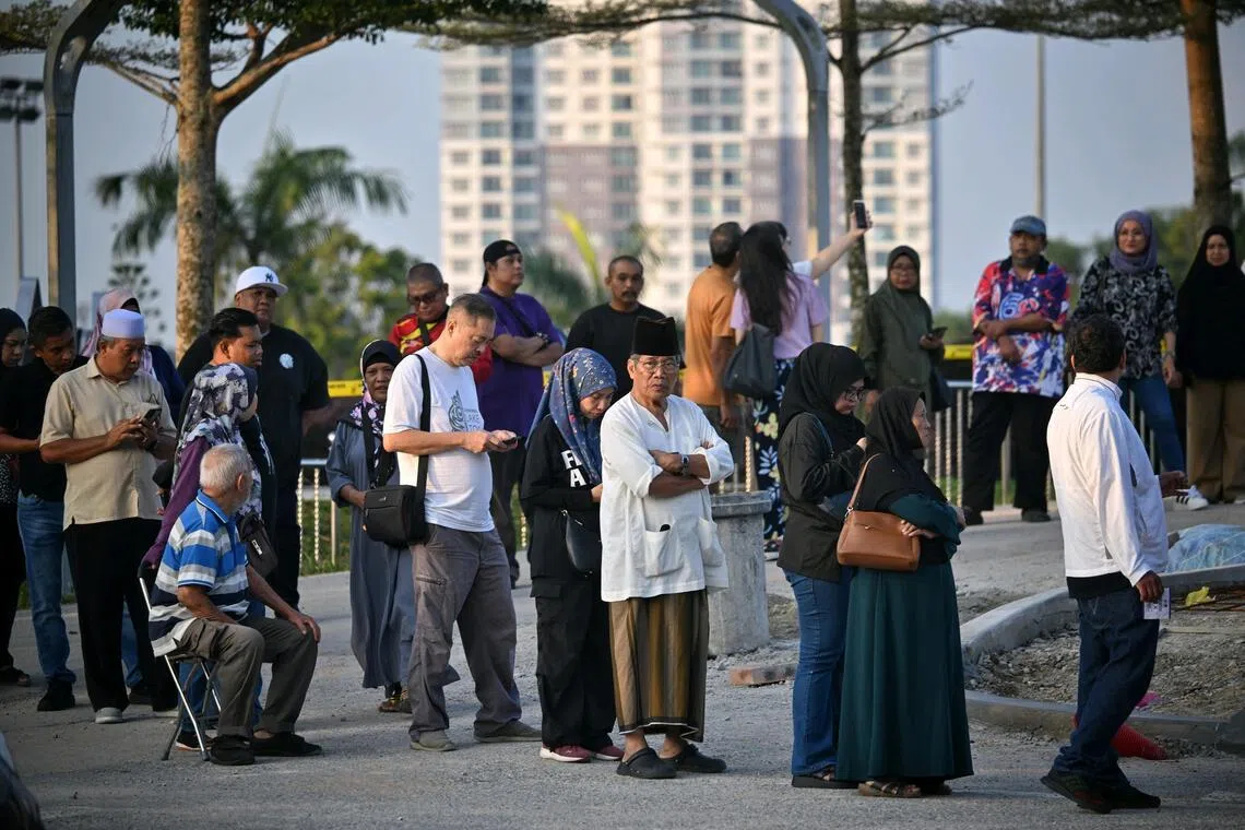Voters at Tanjung Puteri Primary School in Larkin, Johor, to cast their votes for the Johor state election on July 11.