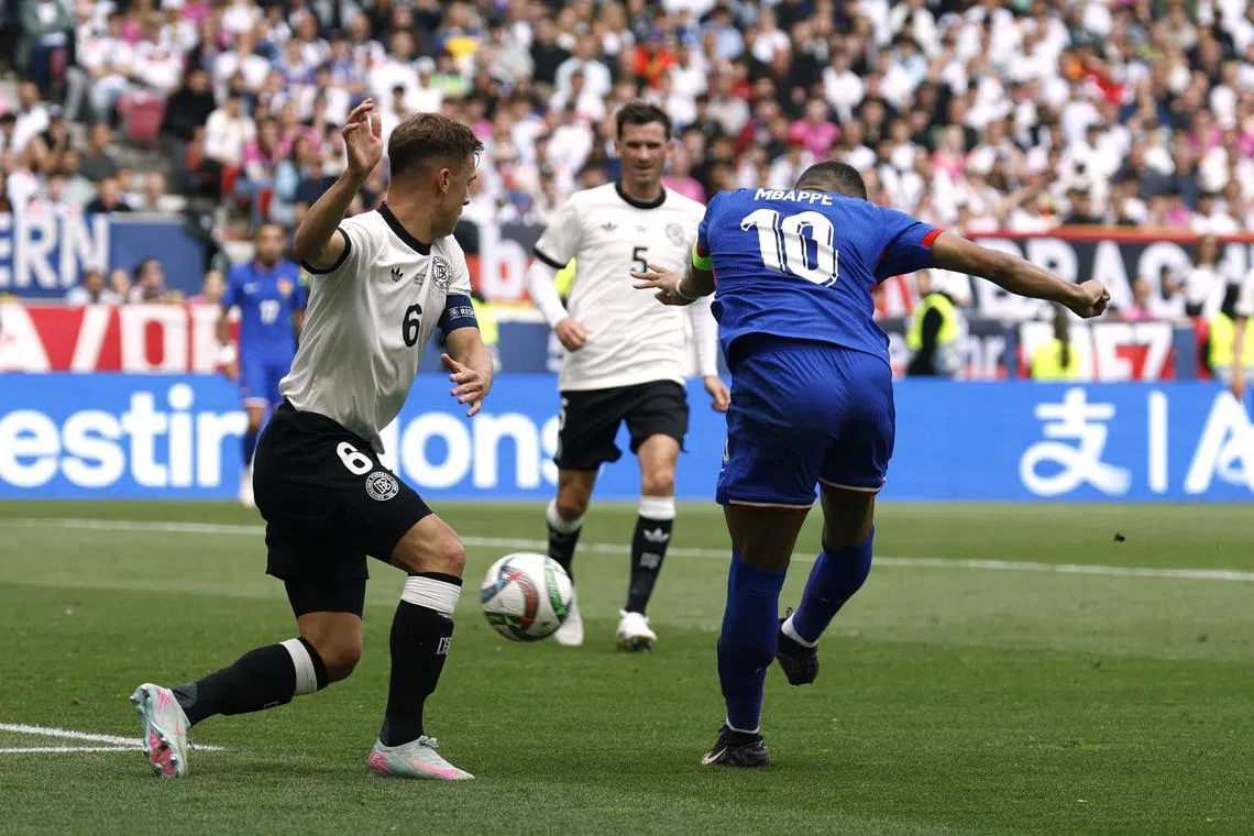 Soccer Football - Nations League - Third Place Play Off Match - Germany v France - MHPArena, Stuttgart, Germany - June 8, 2025 France's Kylian Mbappe scores their first goal REUTERS/Heiko Becker