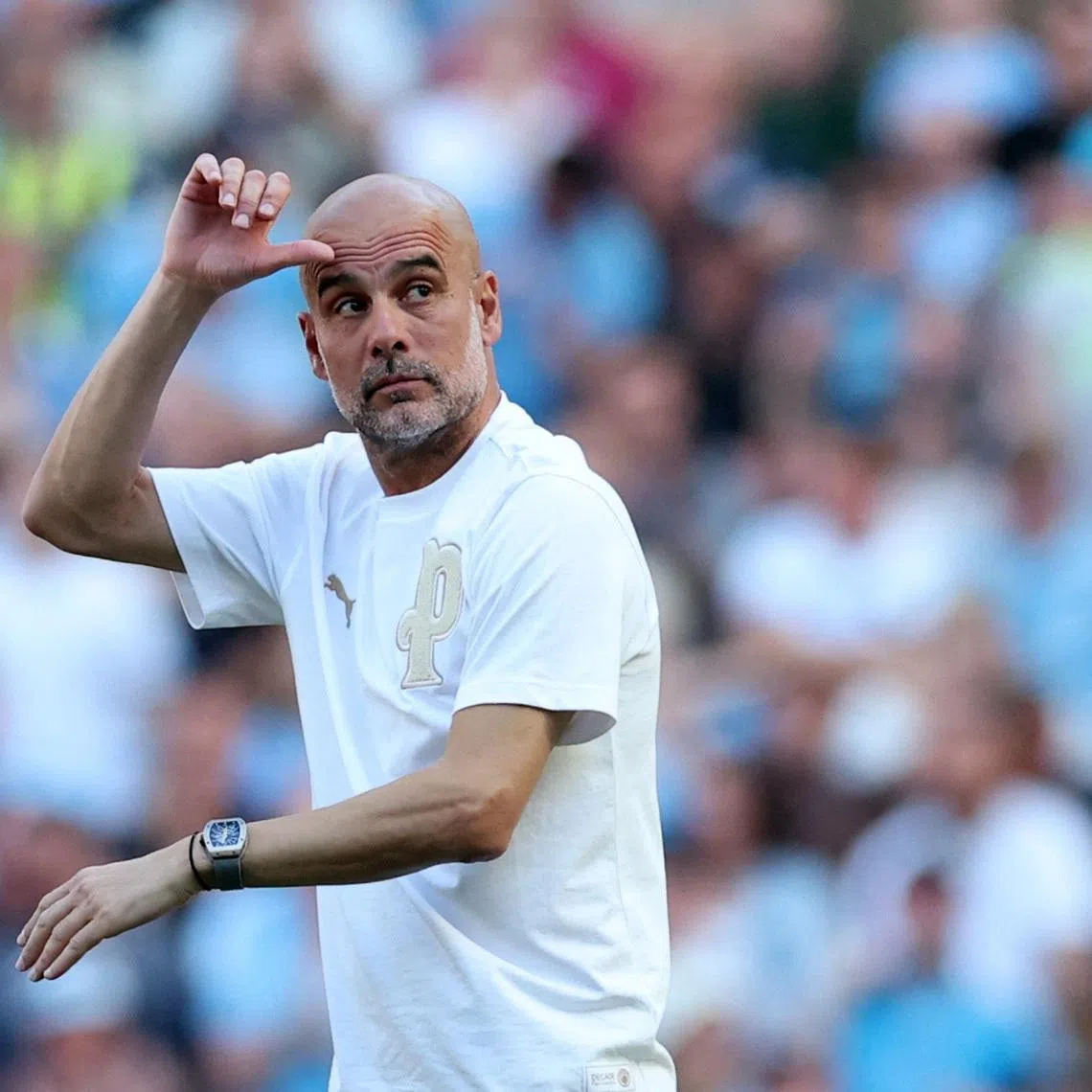 Soccer Football - Premier League - Manchester City v Aston Villa - Etihad Stadium, Manchester, Britain - May 24, 2026 Manchester City manager Pep Guardiola reacts REUTERS/Phil Noble