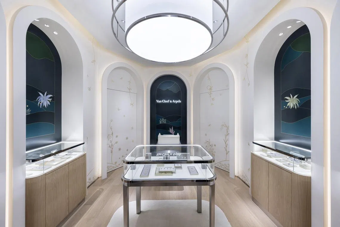 The French maison's new boutique at the Raffles Hotel has a "hidden" exhibition area that can be accessed by a door.