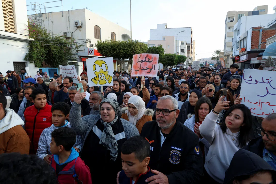 People march on the 15th anniversary of the 2011 uprising to protest over pollution caused by chemical emissions from the state-owned Tunisian Chemical Group's phosphate complex, demanding its closure, in Gabes, Tunisia December 17, 2025. REUTERS/Khaled Nasraoui