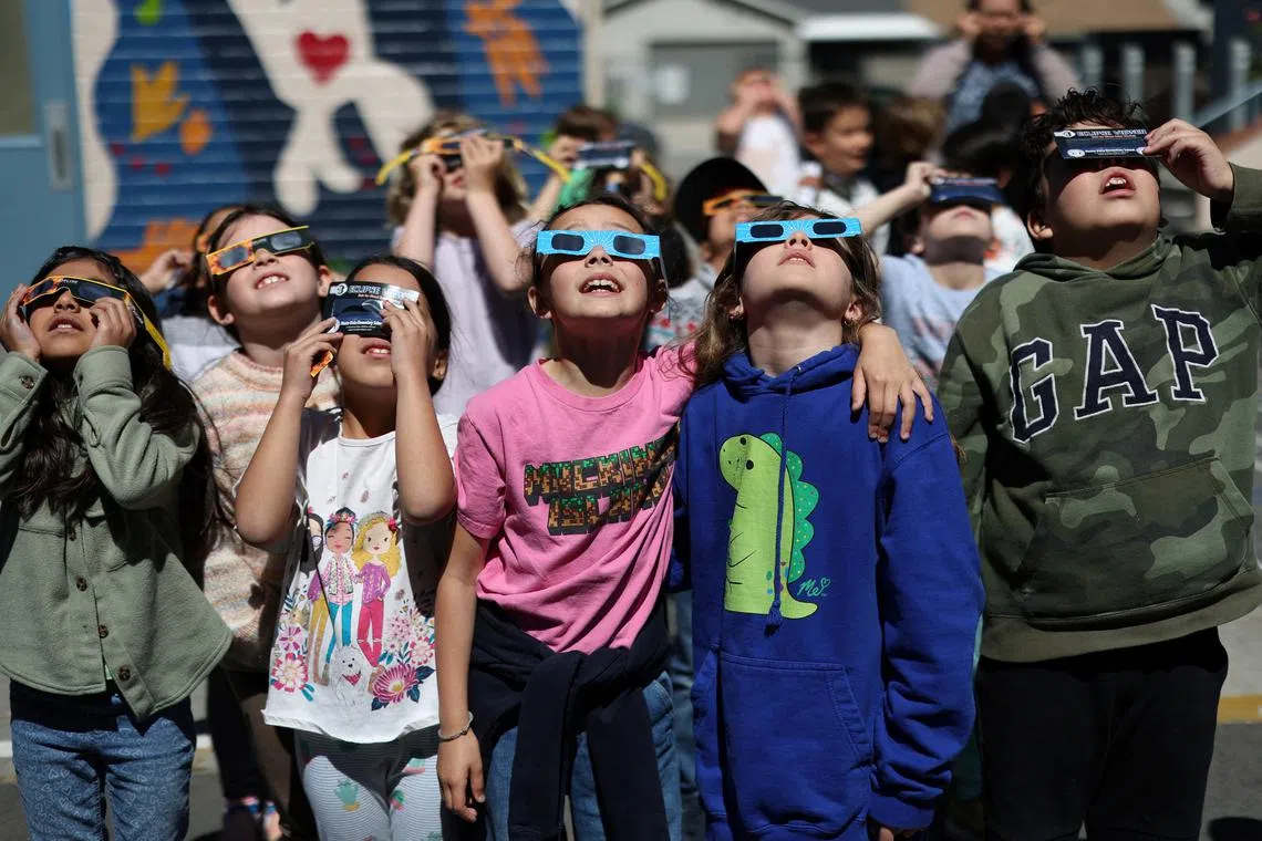 Students watching the solar eclipse at Benjamin Franklin Elementary Magnet School in Glendale, California, on April 8, 2024. 