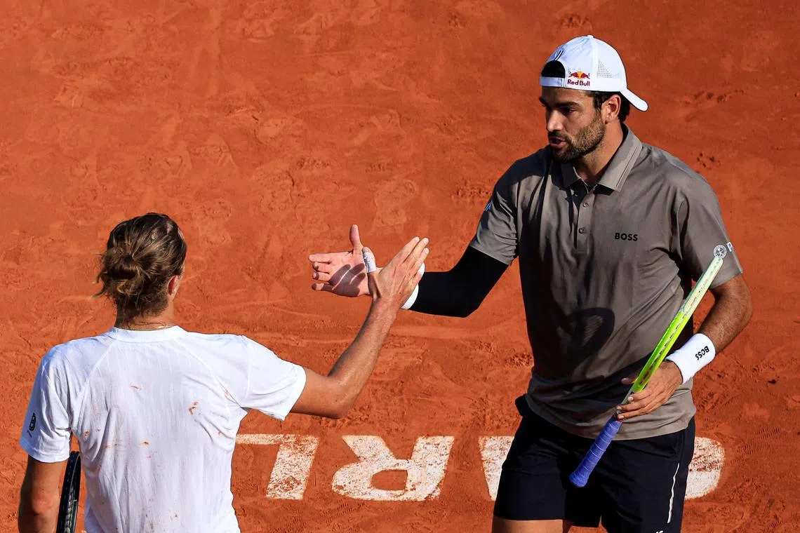 Italy's Matteo Berrettini (right) shaking hands with Germany's Alexander Zverev after his April 8 win.