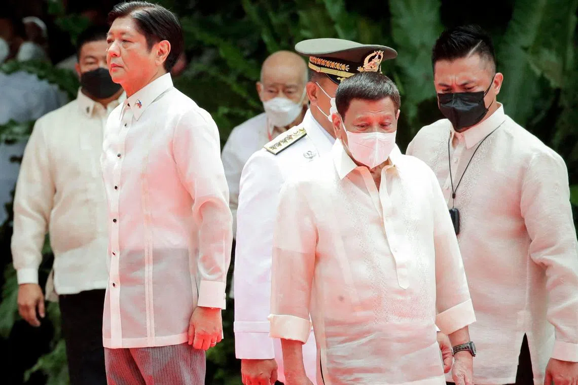 The rift between Philippine President Ferdinand Marcos Jr (left) and the family of his predecessor Rodrigo Duterte (foreground) is threatening to destabilise the country.
