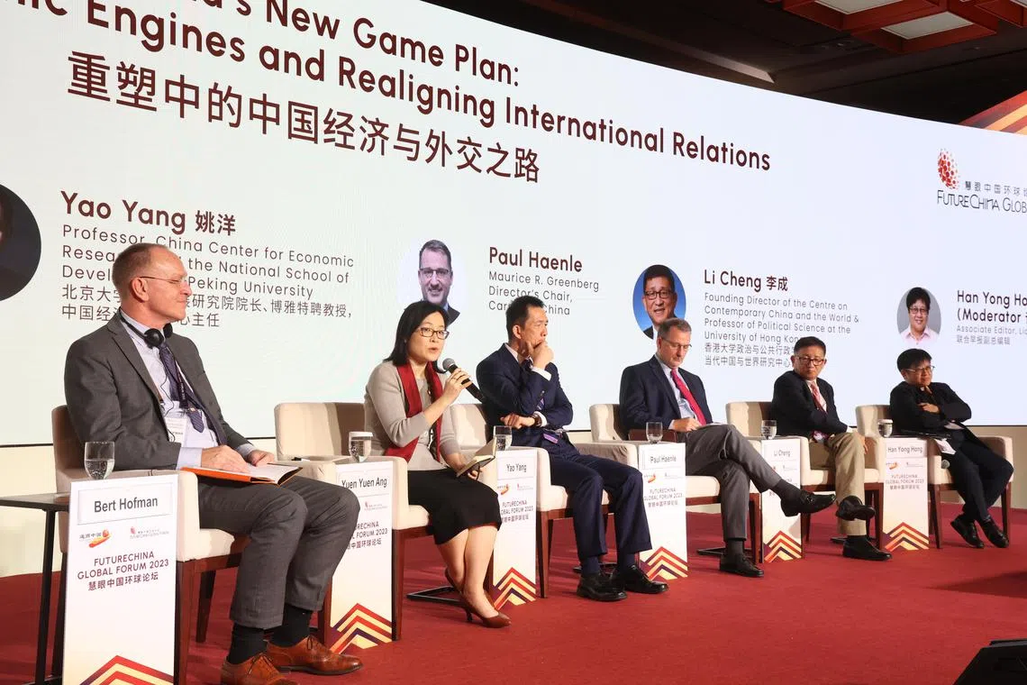 Speakers at a panel on "China's New Game Plan: Reigniting Economic Engines and Realigning International Relations" at the Future China Global Forum on 27 Oct.