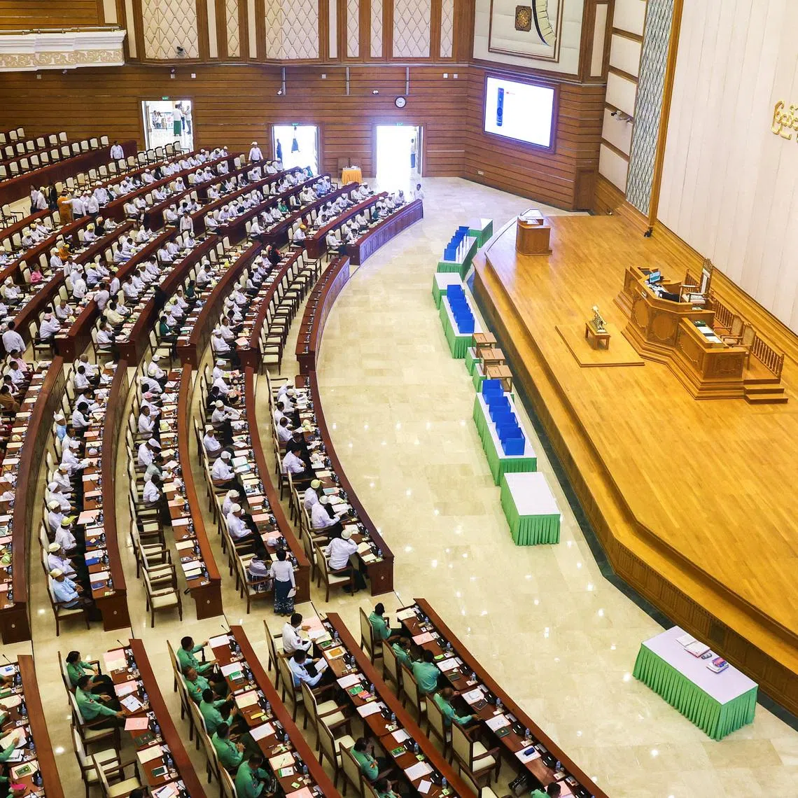 Members of Parliament and military-appointed lawmakers attend a session of the Pyithu Hluttaw (House of Representatives) following a phased election dominated by the army-backed Union Solidarity and Development Party, in Naypyitaw, Myanmar, March 16, 2026. REUTERS/Stringer