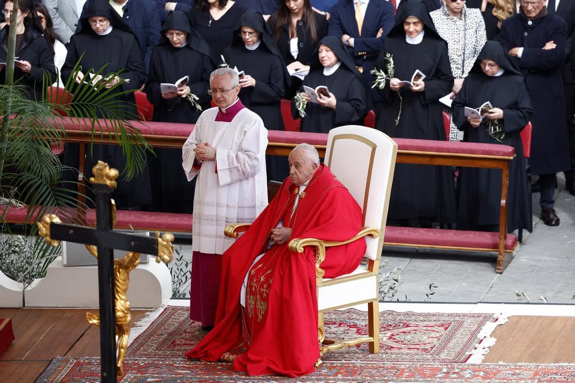 Pope Francis attends the Palm Sunday Mass in Saint Peter's Square at the Vatican, March 24, 2024. REUTERS/Guglielmo Mangiapane