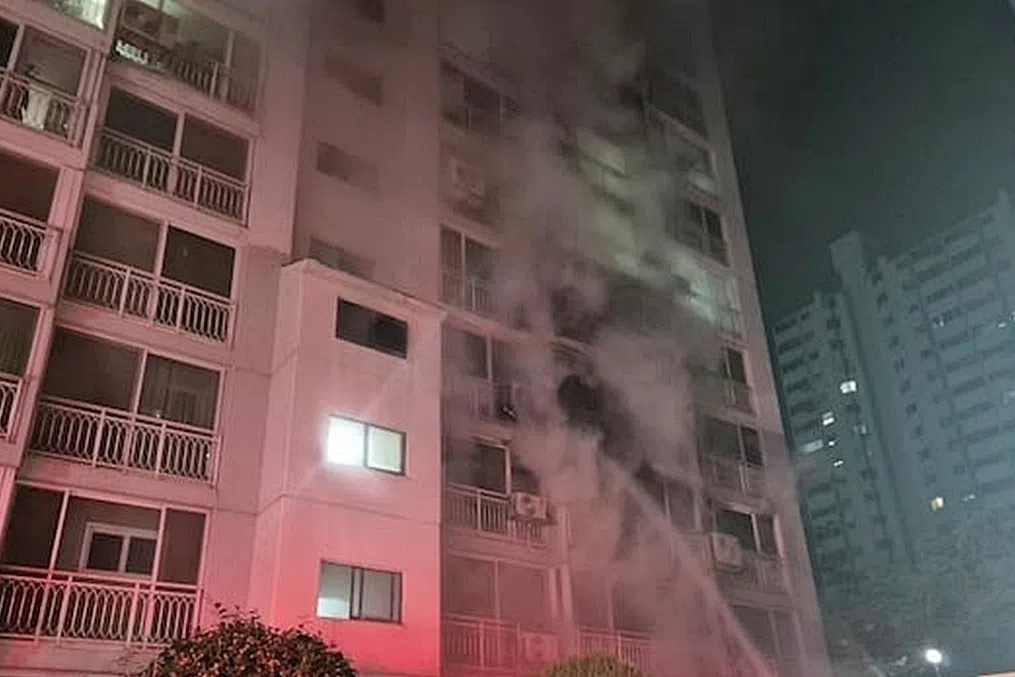 Smoke is seen coming out of a third-floor unit of an apartment building in northern Gwangju, South Korea on Nov 20, 2025.
