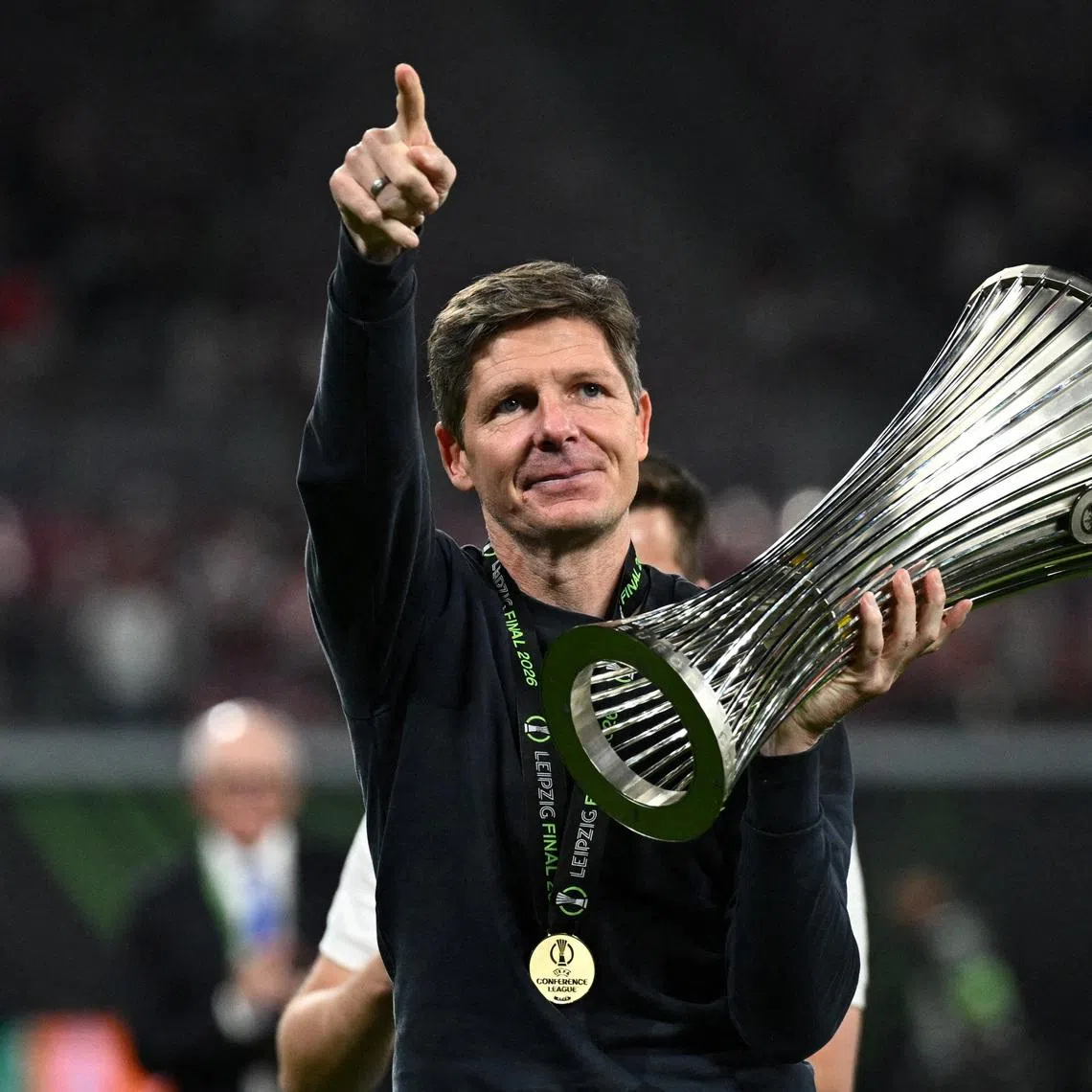 Soccer Football - UEFA Conference League - Final - Crystal Palace v Rayo Vallecano - Red Bull Arena, Leipzig, Germany - May 27, 2026 Crystal Palace manager Oliver Glasner celebrates with the trophy after winning the UEFA Conference League REUTERS/Annegret Hilse