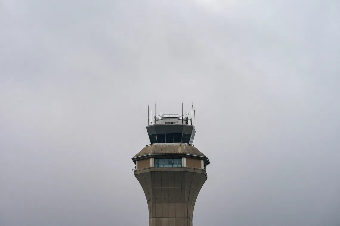 FILE PHOTO: The air traffic control tower at Newark Liberty International Airport is seen in Newark, New Jersey, U.S., May 9, 2025. REUTERS/David 'Dee' Delgado/File Photo