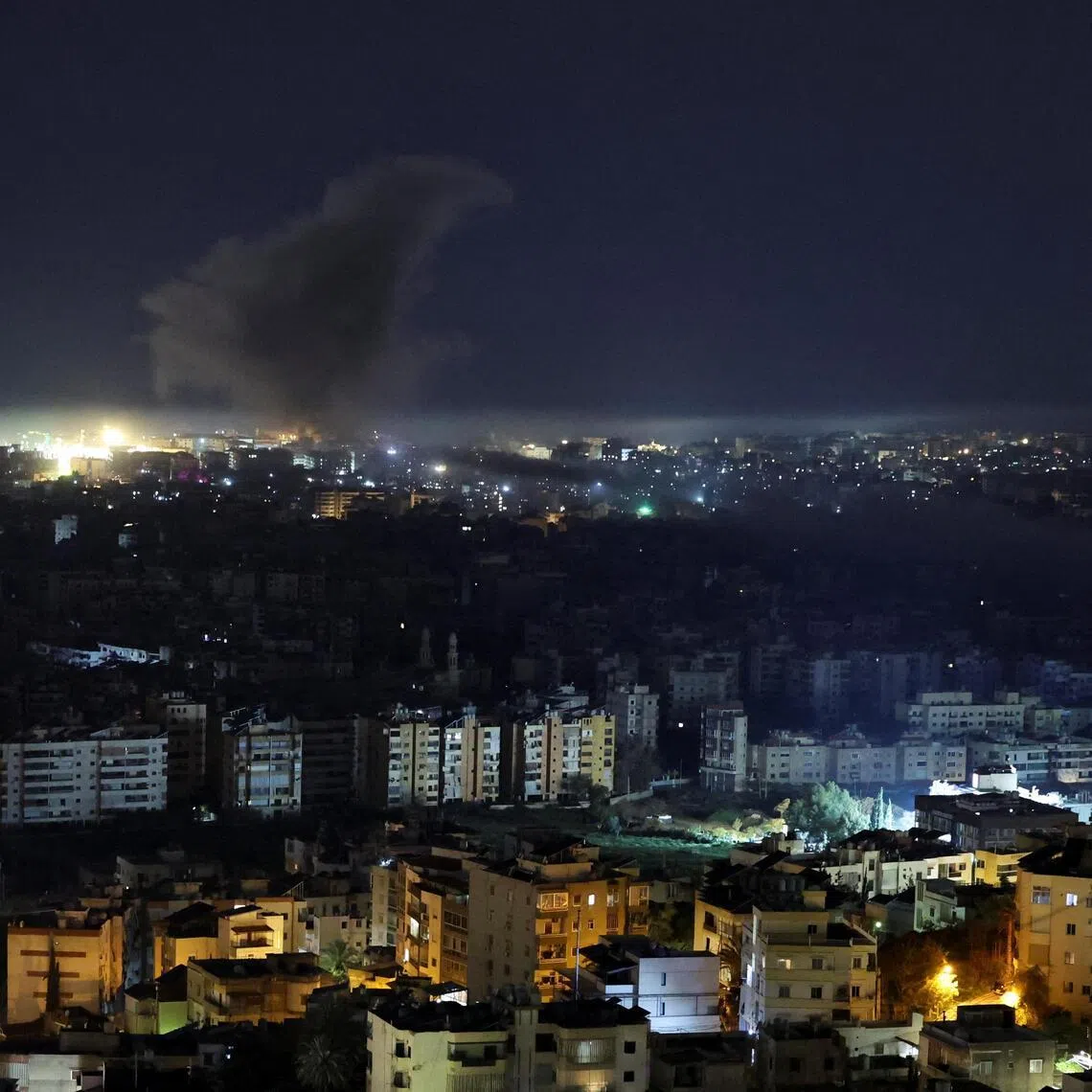 Smoke rises from Beirut's southern suburbs following an Israeli strike.
