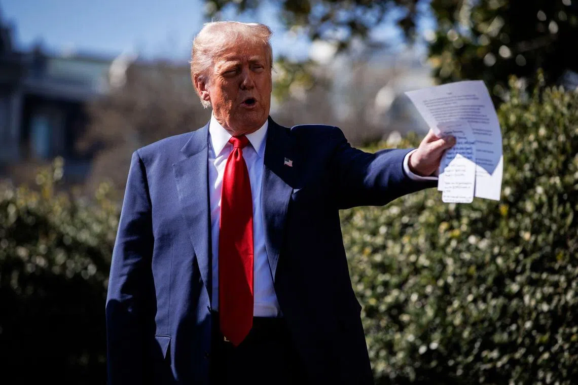 US President Donald Trump taking questions from the media outside the White House, on March 11.
