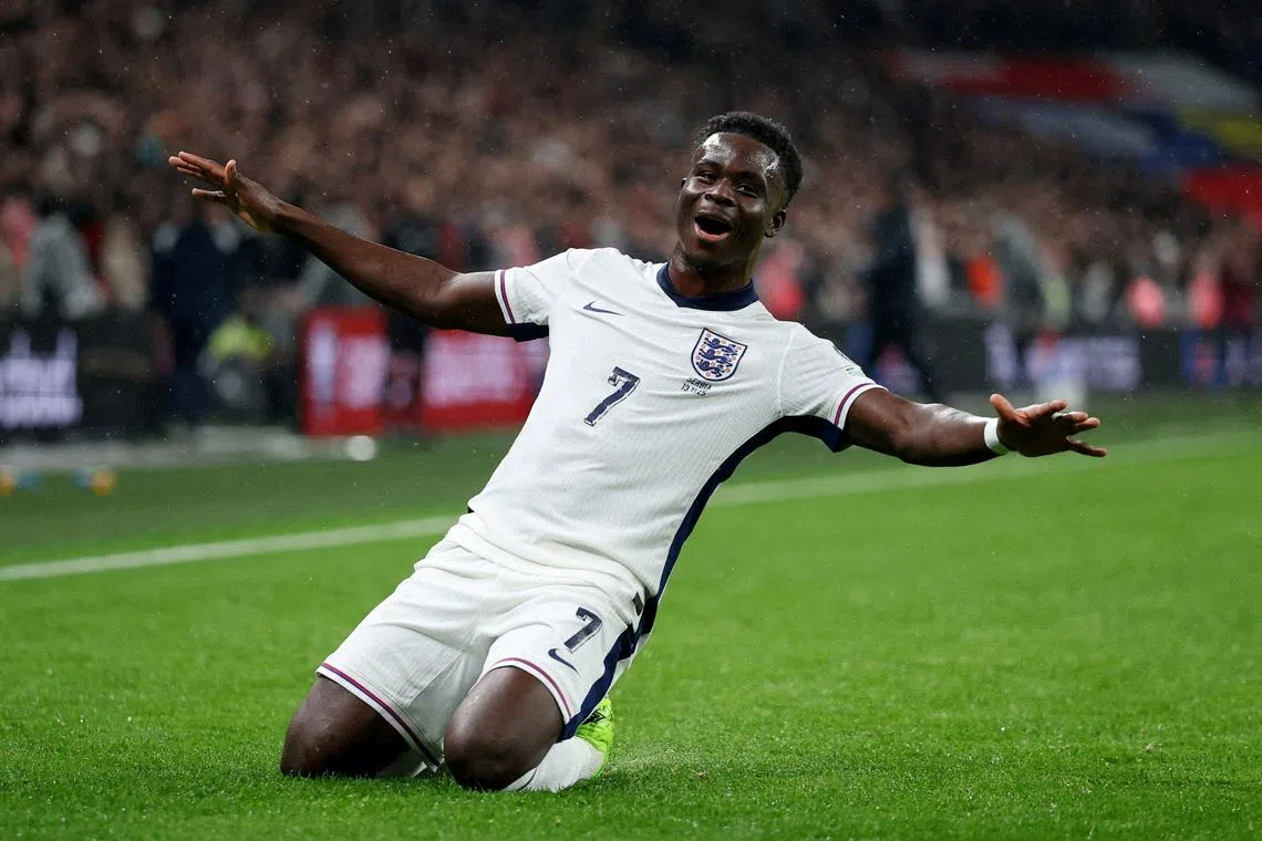 FILE PHOTO: Soccer Football - World Cup - UEFA Qualifiers - Group K - England v Serbia - Wembley Stadium, London, Britain - November 13, 2025 England's Bukayo Saka celebrates scoring their first goal REUTERS/Toby Melville/File Photo
