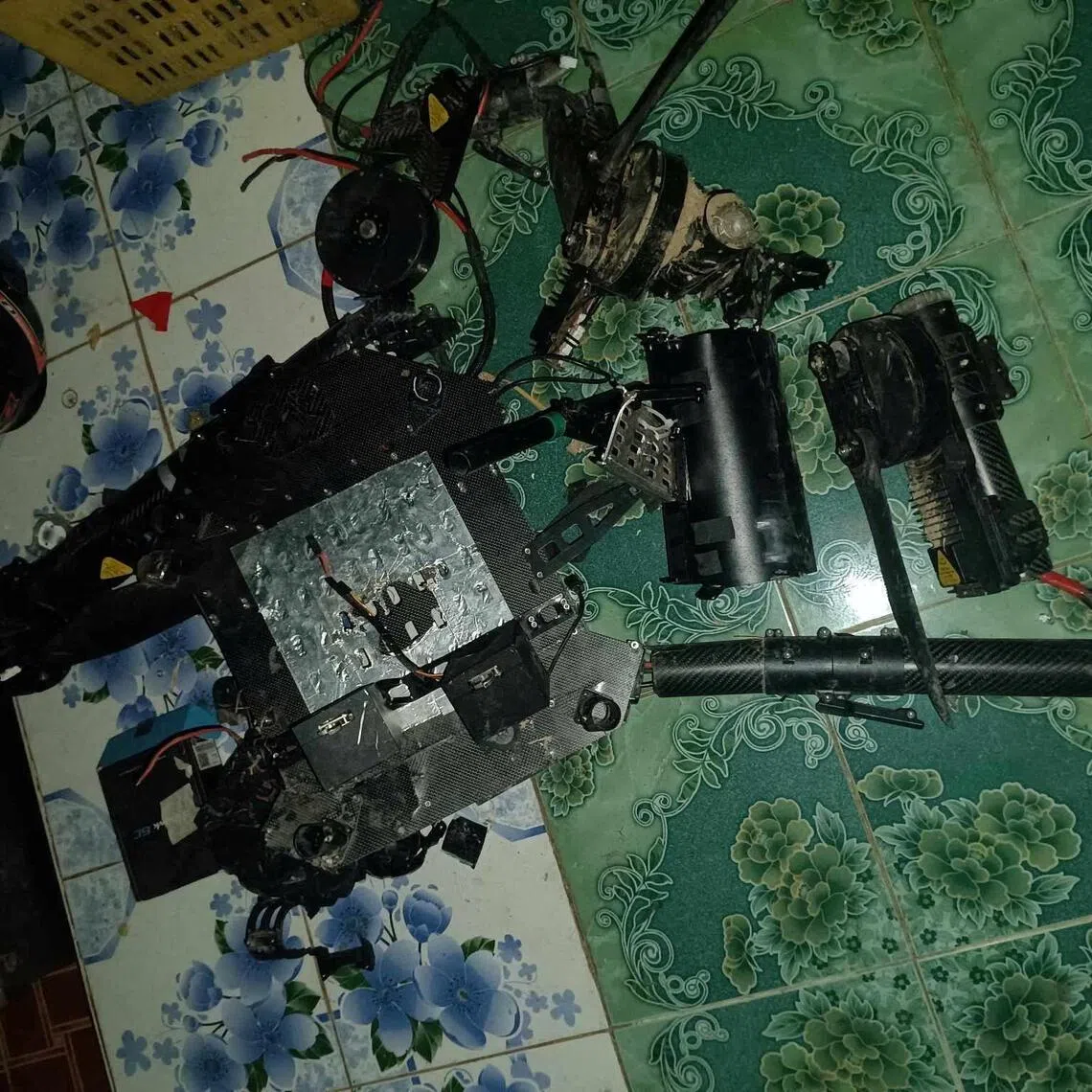 Debris reportedly belonging to a drone, which was shot down by Myanmar resistance fighters, is pictured in south-eastern Myanmar, in June 2024.