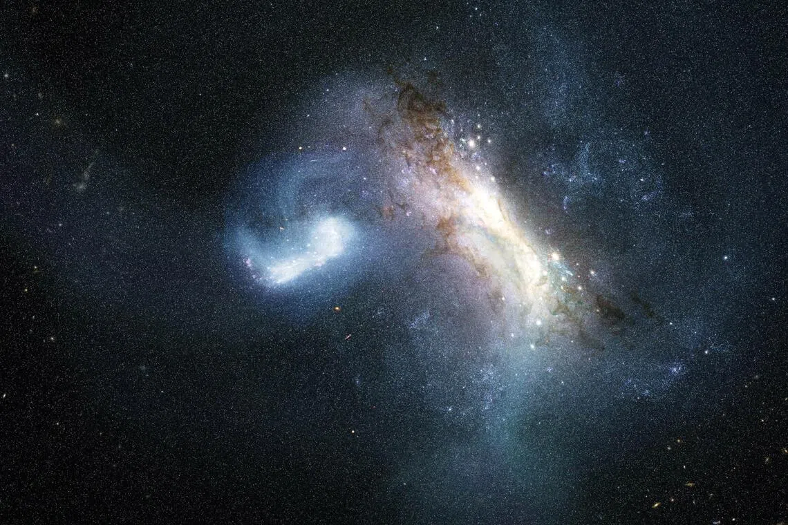 The collision about 11.8 billion years ago, when a dwarf galaxy known as LKH collided with the Milky Way and merged with it, appears in an artist’s concept released on Aug 17.