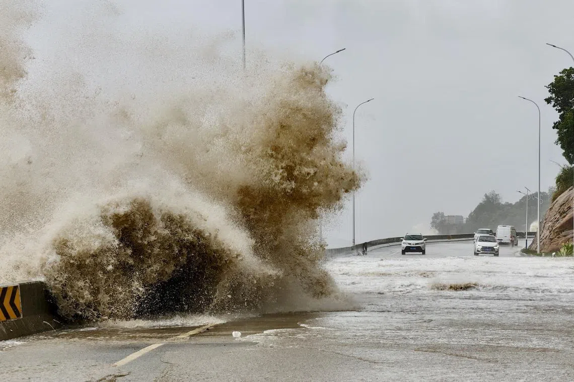 FILE PHOTO: Waves crash on the coast of Sansha town as Typhoon Gaemi approaches, in Ningde, Fujian province, China July 25, 2024. cnsphoto via REUTERS/File Photo