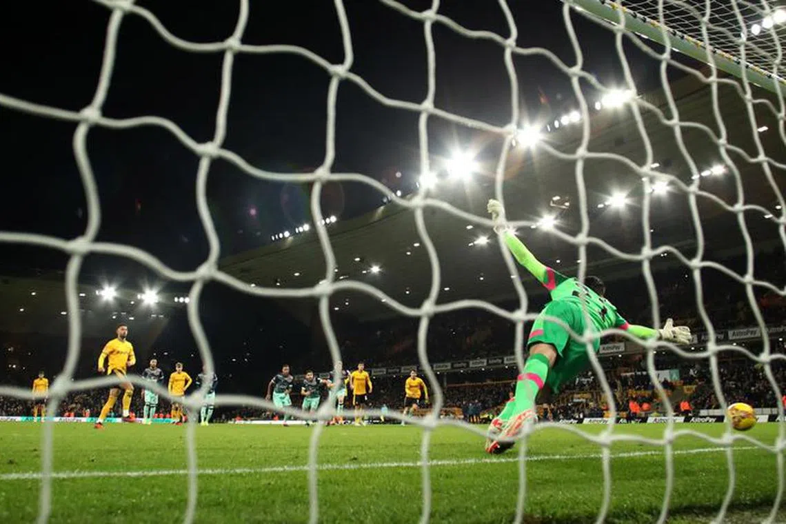 Soccer Football - FA Cup - Third Round Replay - Wolverhampton Wanderers v Brentford - Molineux Stadium, Wolverhampton, Britain - January 16, 2024  Wolverhampton Wanderers' Matheus Cunha scores their third goal from the penalty spot past Brentford's Thomas Strakosha Action Images via Reuters/Andrew Boyers/ File photo