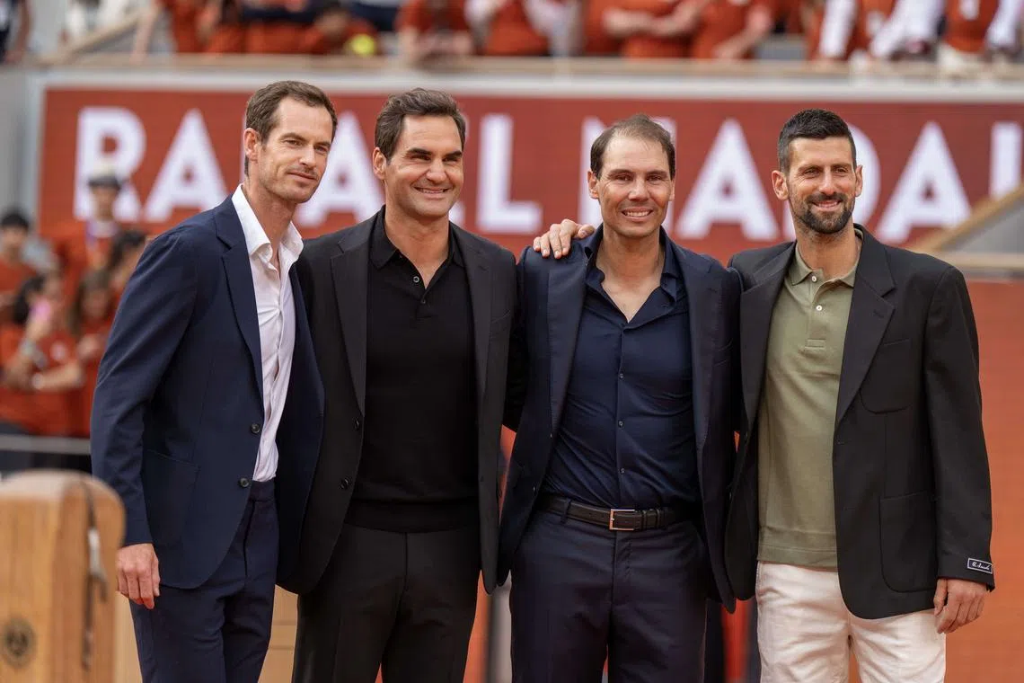 May 25, 2025; Paris, FR; Roger Federer of Switzerland, Novak Djokovic of Serbia and Andy Murray of Great Britain with Rafael Nadal of Spain during the presentation ceremony paying tribute to the career of Rafael Nadal of Spain  on a packed Court Philippe Chatrier Courtday on day one at Roland Garros Stadium. Mandatory Credit: Susan Mullane-Imagn Images