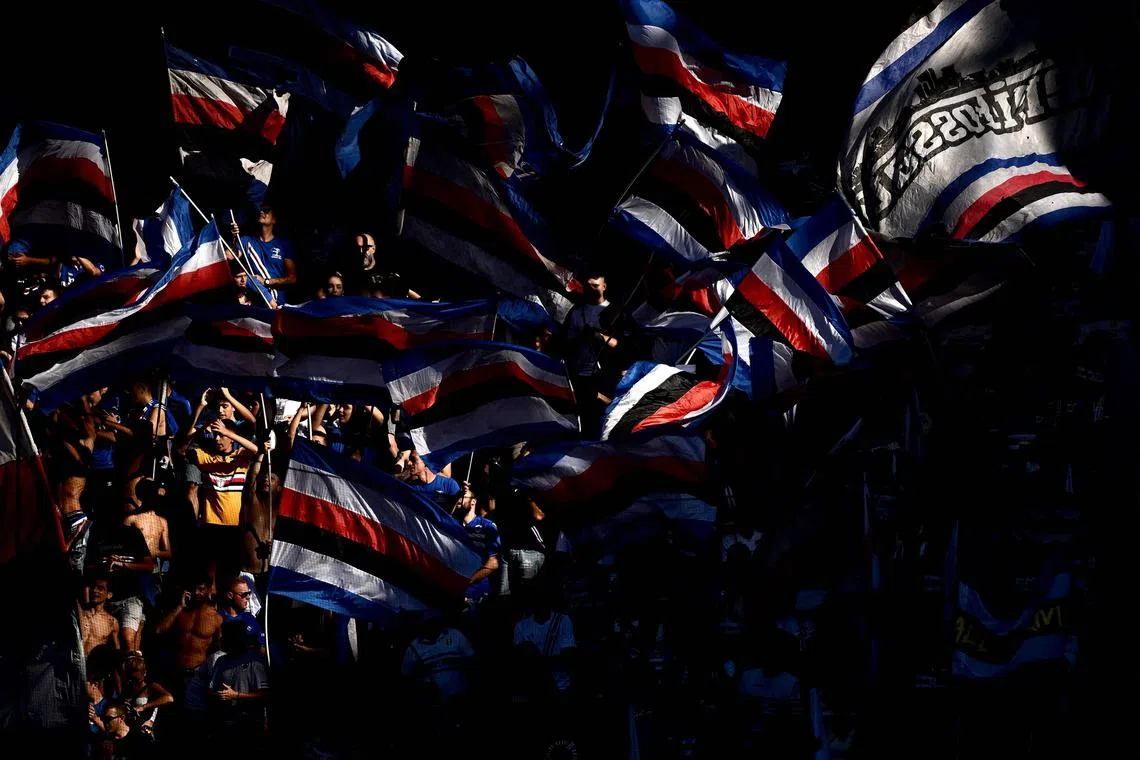 Sampdoria's supporters waving flags during the 2022-23 season, when the side were relegated from Serie A. 