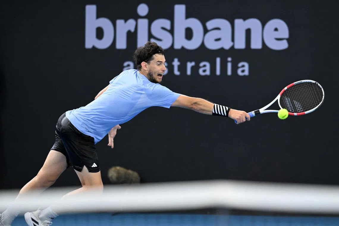 Austria's Dominic Thiem in action against James McCabe of Australia, in Brisbane, Australia.