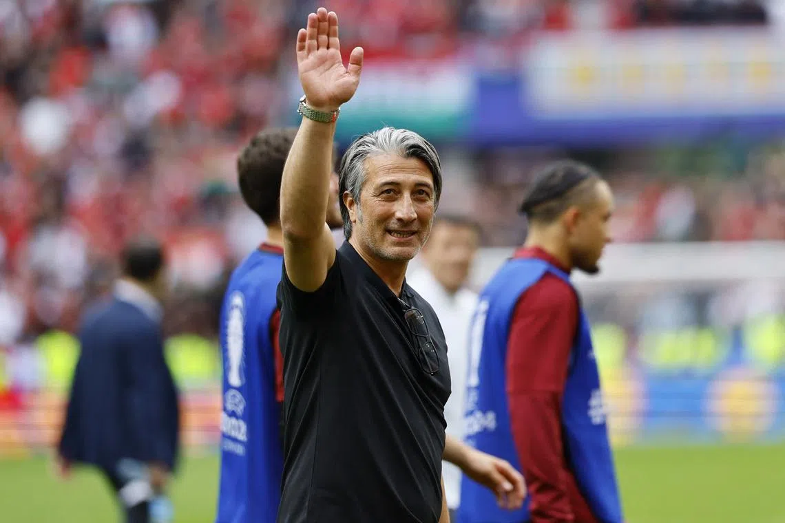 FILE PHOTO: Soccer Football - Euro 2024 - Group A - Hungary v Switzerland - Cologne Stadium, Cologne, Germany - June 15, 2024 Switzerland coach Murat Yakin celebrates after the match REUTERS/Wolfgang Rattay/File Photo