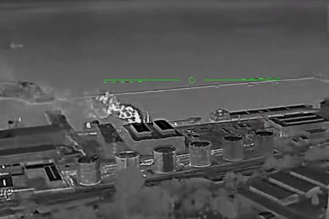 Ukrainian drones closing in on a Russian oil depot, in a screenshot from a video posted online by the Ukrainian military.