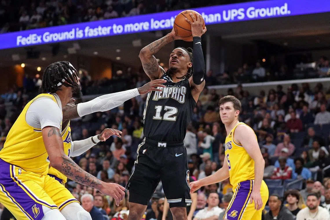 Ja Morant of the Memphis Grizzlies takes a shot during the first half against the Los Angeles Lakers at FedExForum.